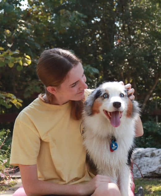 Drop-In Pet Sitting Service with pet sitter and husky in Bryan-College Station